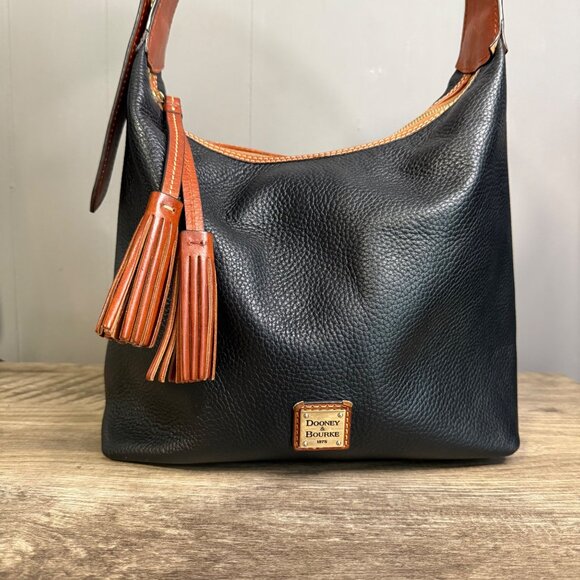 Dooney & Bourke Black Pebble Leather Shoulder Bag With Adjustable Strap & Tassel - Picture 1 of 11